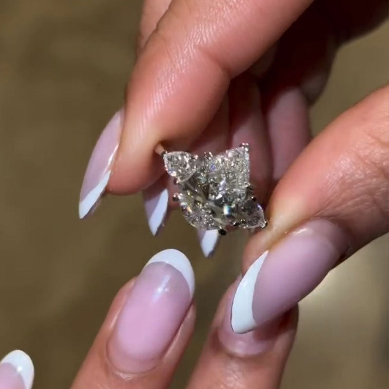 Luxurious Pear Cut Three Stone Sterling Silver Engagement Ring