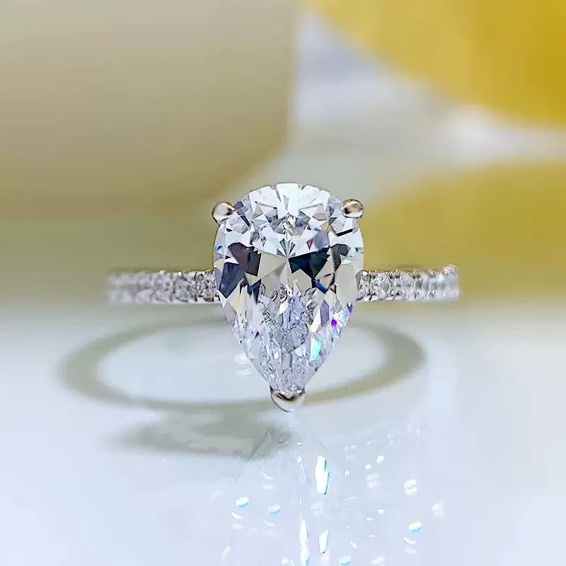 Pear Cut Sterling Silver Ring With Eternity Band