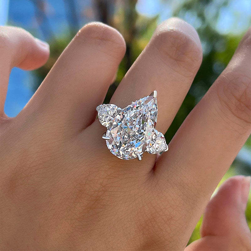 Three Stone Pear Cut Engagement Ring In Sterling Silver