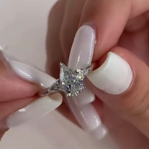Pear Cut Three Stones Engagement Ring