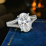 4.5ct Oval Cut Solitaire Engagement Ring with Pavé Band in Sterling Silver
