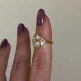 Elegant Oval Cut Gold Tone Sterling Silver Ring with Side Accents