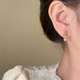 Elegant Round Cut Moissanite Dangle Stud Earrings in Sterling Silver