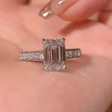 Emerald Cut Sterling Silver Engagement Ring With Paved Band
