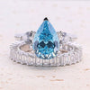 4.0ct Pear Cut Blue Gemstone Engagement ring with Eternity Band