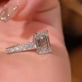 Emerald Cut Sterling Silver Engagement Ring With Paved Band