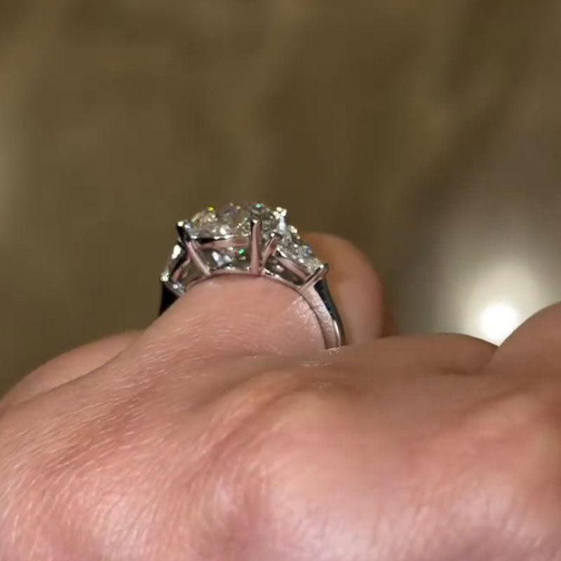 Luxurious Pear Cut Three Stone Sterling Silver Engagement Ring