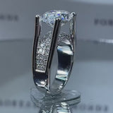 4.5ct Distinctive Inverted Tension-set Oval Cut Sterling Silver Moissanite Engagement Ring