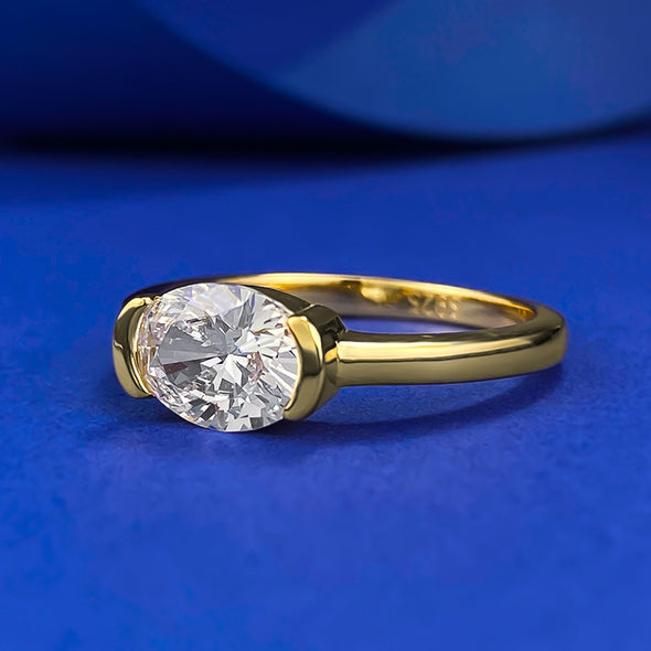 Exquisite Oval Cut Golden Tone Engagement Ring in Sterling Silver