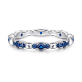 Blue Stone Wedding Band in Sterling Silver