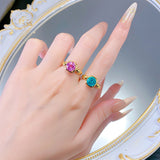 Paraiba Round Cut Bezel Setting Engagement Ring in Sterling Silver