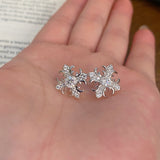Moissanite Flower Cross Design Stud Earrings in Sterling Silver