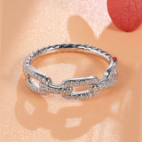 Moissanite Interlocking Link Band Ring in Sterling Silver