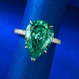 Unique Fancy Green Sterling Silver Solitaire Engagement Ring with Pear Cut Gemstone