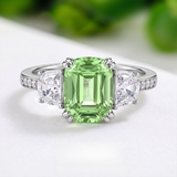 Emerald Cut Three Stone Engagement Ring in Sterling Silver