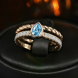 Pear Cut Blue Stone Engagement Ring in Sterling Silver