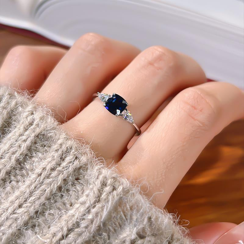 Three Stone Blue Cushion Cut Sterling Silver Ring