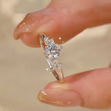 Round Cut Lunaire Cluster Moissanite Engagement Ring in Sterling Silver
