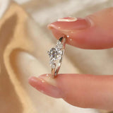 Round Cut Lunaire Cluster Moissanite Engagement Ring in Sterling Silver