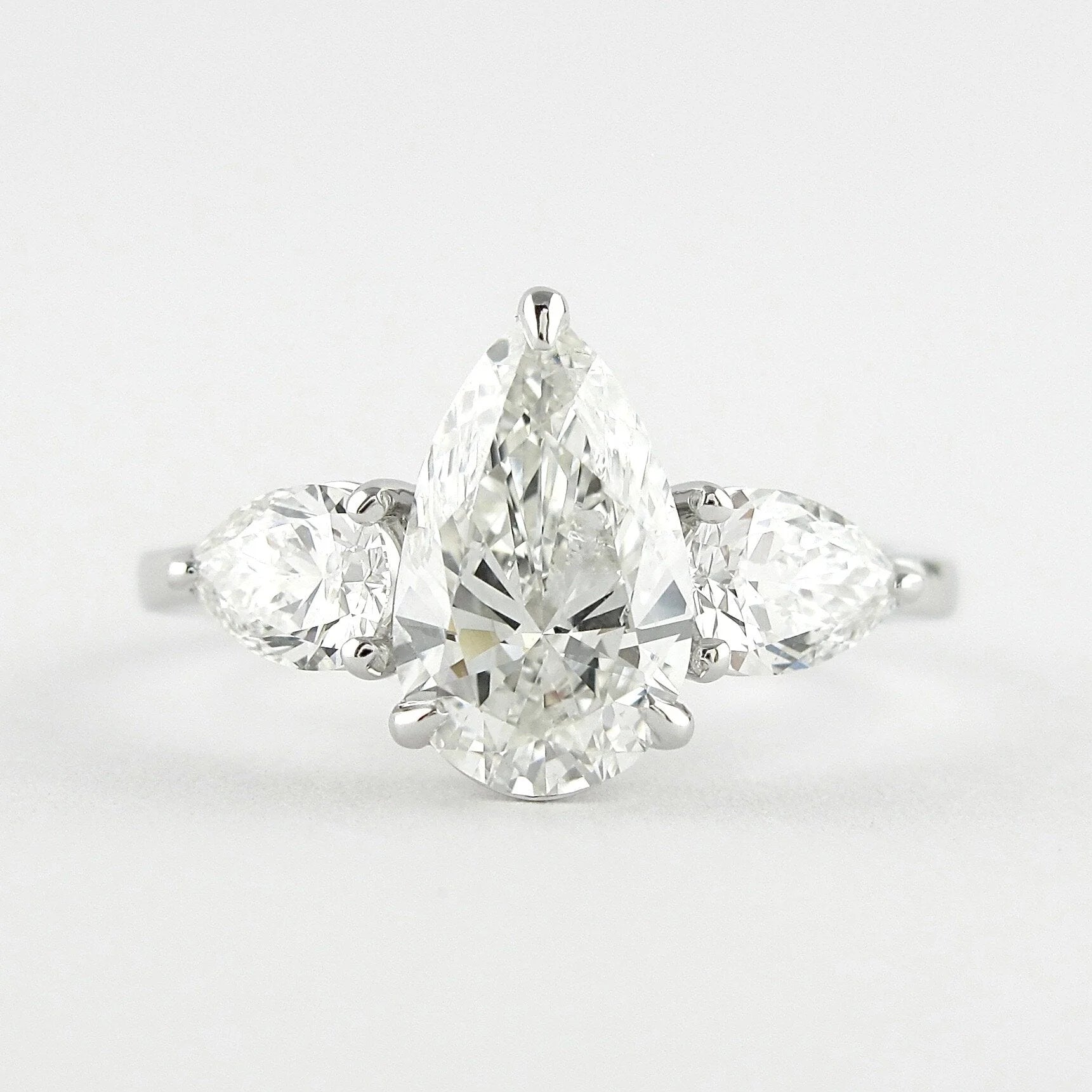 Pear Cut Three Stones Engagement Ring