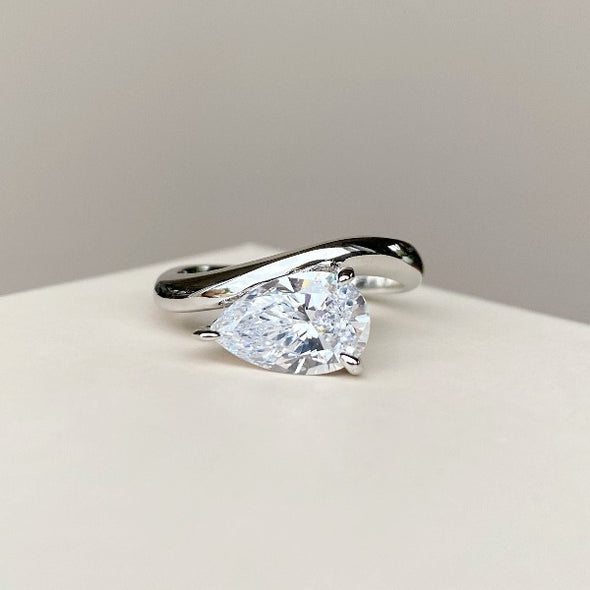 Pear Cut East to West Engagement Ring