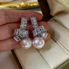 Elegant Pearl Drop Earrings with Baguette Stone Accents