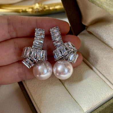 Elegant Pearl Drop Earrings with Baguette Stone Accents
