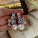 Elegant Pearl Drop Earrings with Baguette Stone Accents