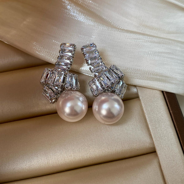 Elegant Pearl Drop Earrings with Baguette Stone Accents