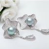 Elegant Pearl Shell Design Drop Earrings in Sterling Silver