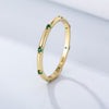 Stylish Golden Tone Wedding Band with Gemstone Accents