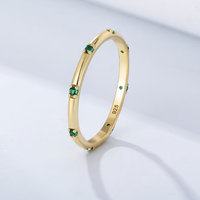 Stylish Golden Tone Wedding Band with Gemstone Accents