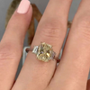 Two Tone Radiant Cut Three Stone Engagement Ring