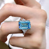 Emerald Cut Sky Blue Gemstone Three Stone Sterling Silver Engagement Ring