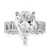 Handmade Pear Cut Sterling Silver Engagement Ring With Emerald Cut Eternity Band