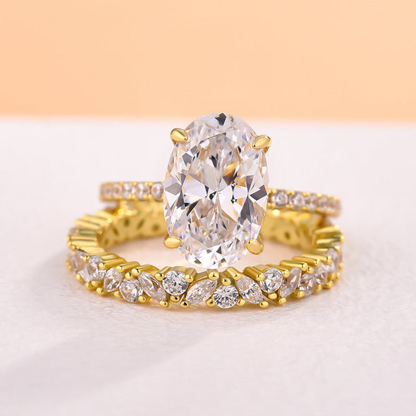 Golden Tone Oval Cut Sterling Silver Bridal Set with Exquisite Marquise & Round Cut Band