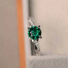 Emerald Green Sterling Silver Engagement Ring With Twist Band