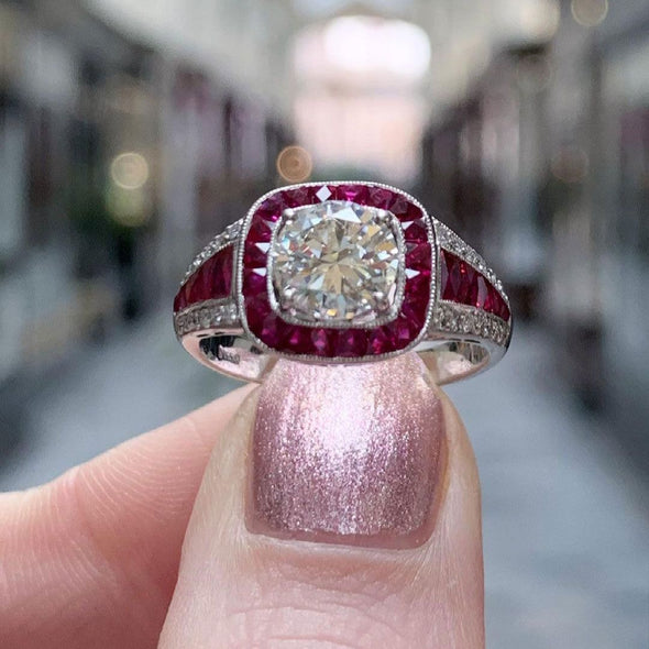 Vintage Ruby Calibre Halo Engagement Ring