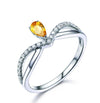Fancy Yellow Pear Cut Engagement Ring With Infinity Band