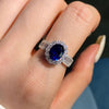 Halo Oval Cut Blue Sapphire Engagement Ring in Sterling Silver