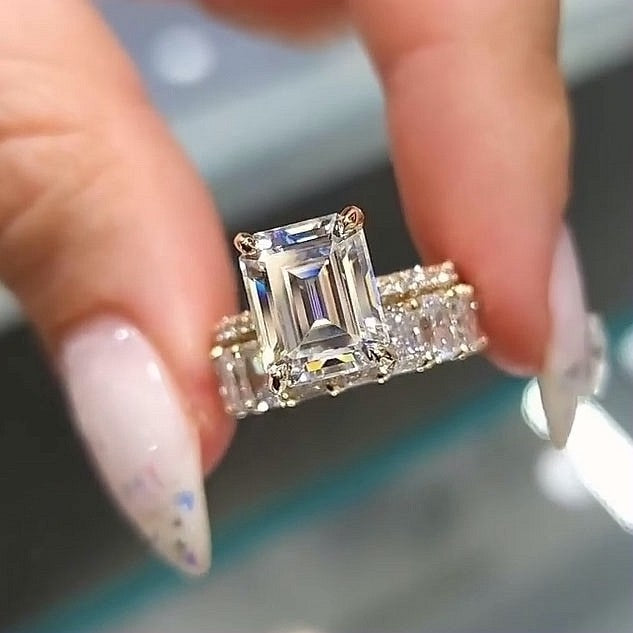 Emerald cut 5 carat engagement ring