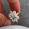 Blue Radiant Cut Engagement Ring in Sterling Silver with Marquise Cluster Side Stone
